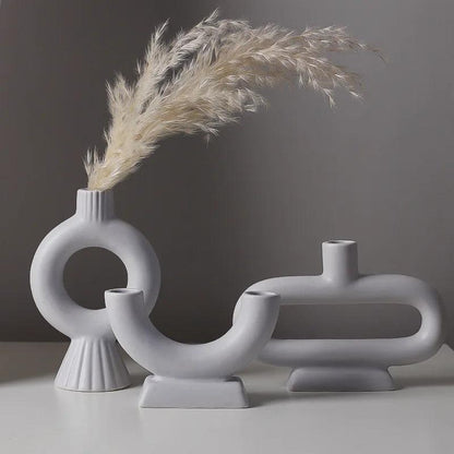 Minimalistischer skandinavischer Kerzenhalter und Vase aus Eisen und Glas