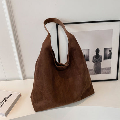 Chéa™ - The suede bag
