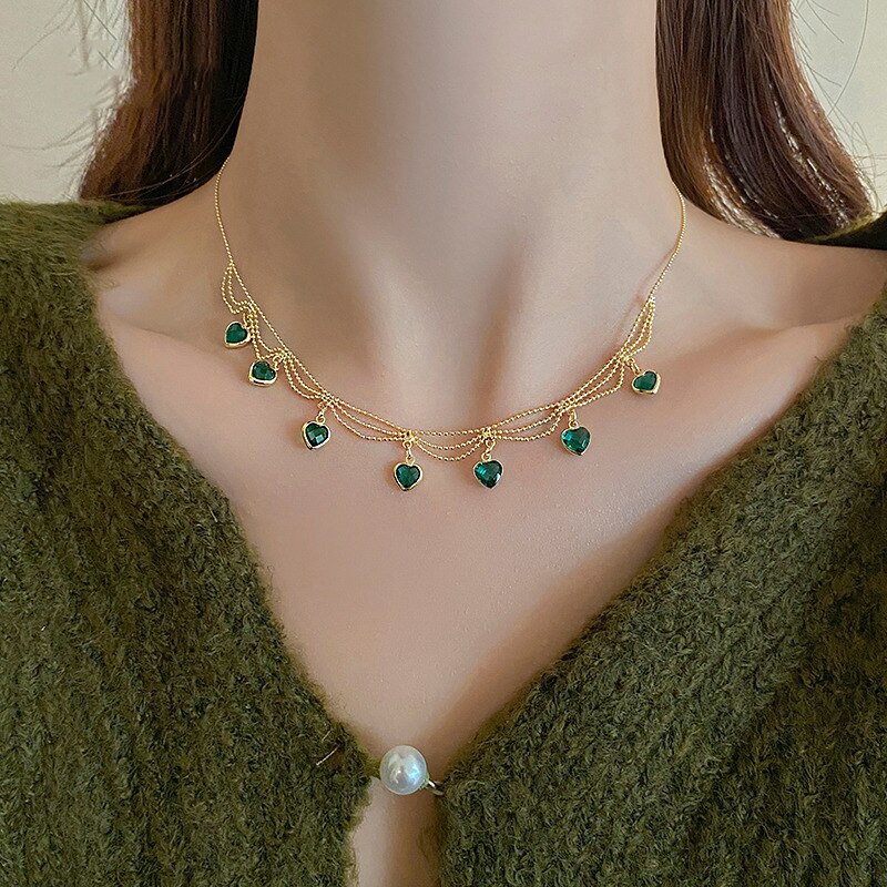 CrystalMesh™ | Green crystal pendant made of braided metal mesh 