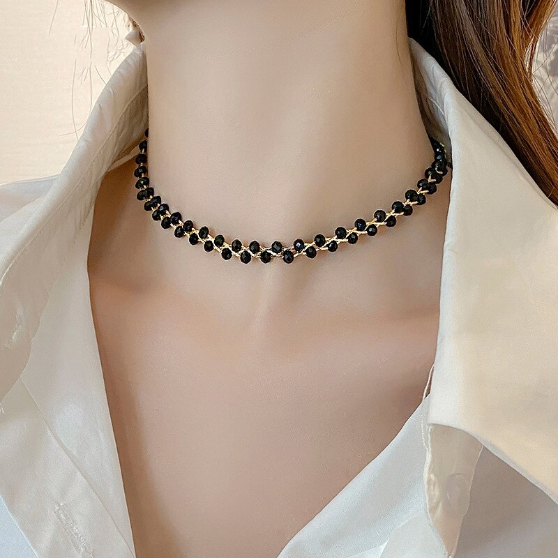 CrystalMesh™ | Green crystal pendant made of braided metal mesh 