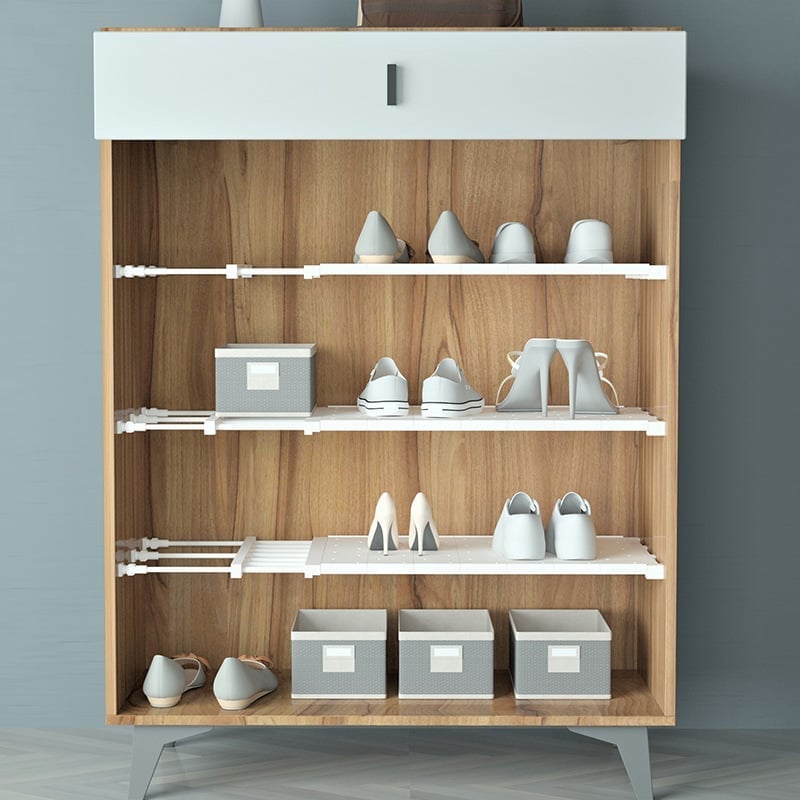 OrganizeEase™ – Erweiterbares Spannregal für den Kleiderschrank